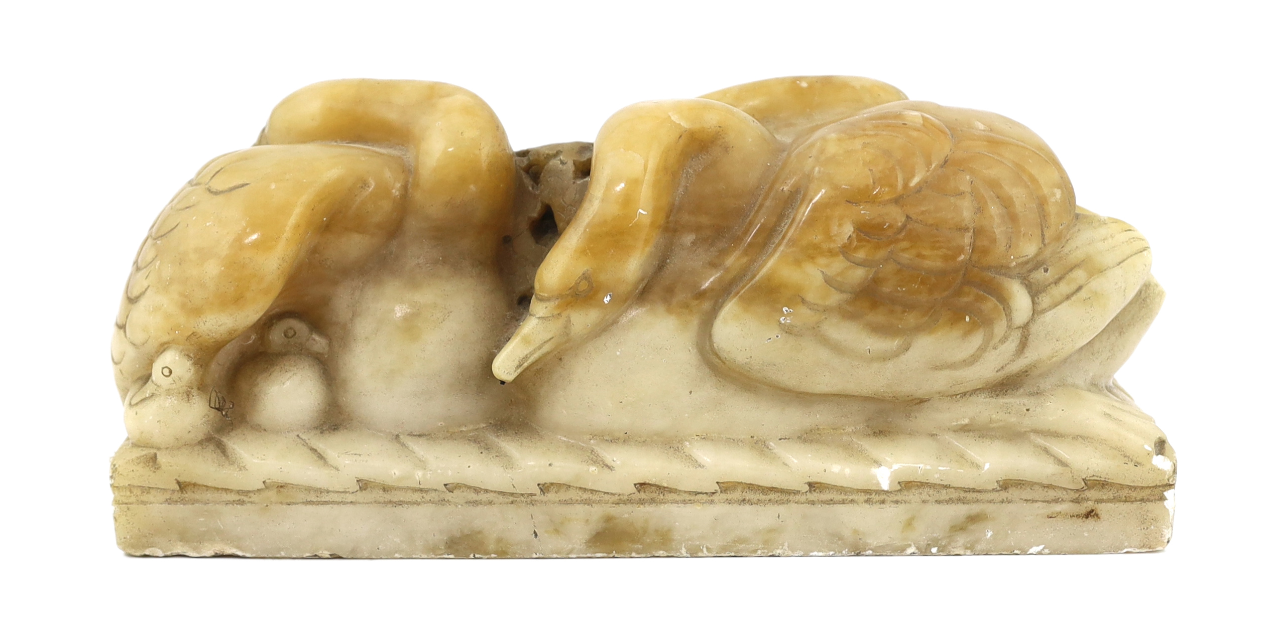 William McMillan A.R.A. (1887-1997), a carved alabaster group 'Swans', 43cm wide, 18cm high